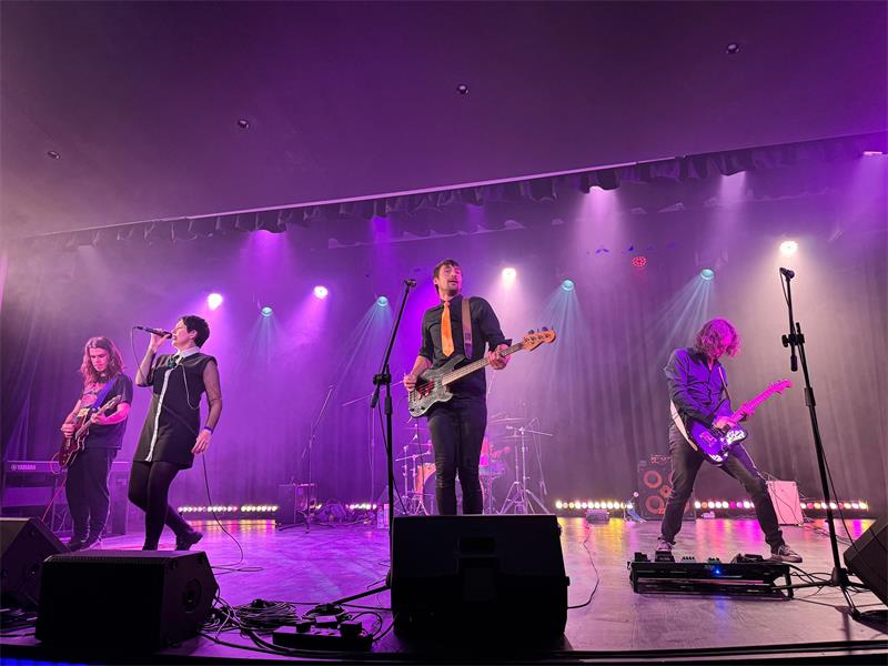 a band performs on stage