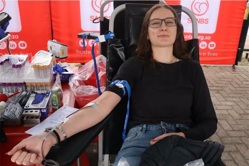 a woman donates blood