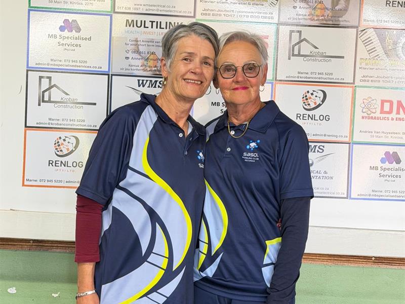 Two women in blue, sky blue and yellow sport shirts
