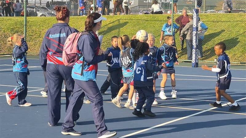 little children playing netball