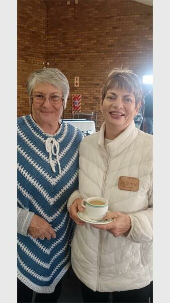two elderly women with tea
