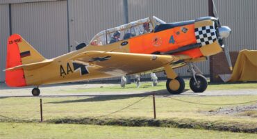 a yellow havard aircraft