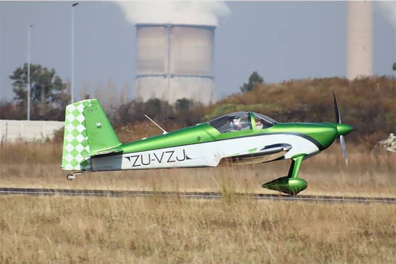light airplane taking off from runway