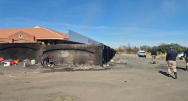 Area against wall where the homeless squatted, is now clean