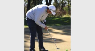 golf player in a white jacket