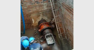 Workers repair the key bulk water supply valve at Graceland Hotel, Casino and Country Club.