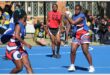 netball teams from two schools compete for the ball