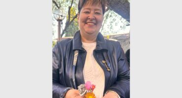 women are making paper flowers