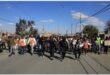 people march in the street