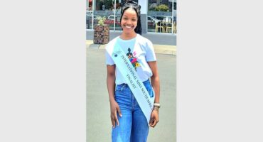 girl with a beauty pageant sash