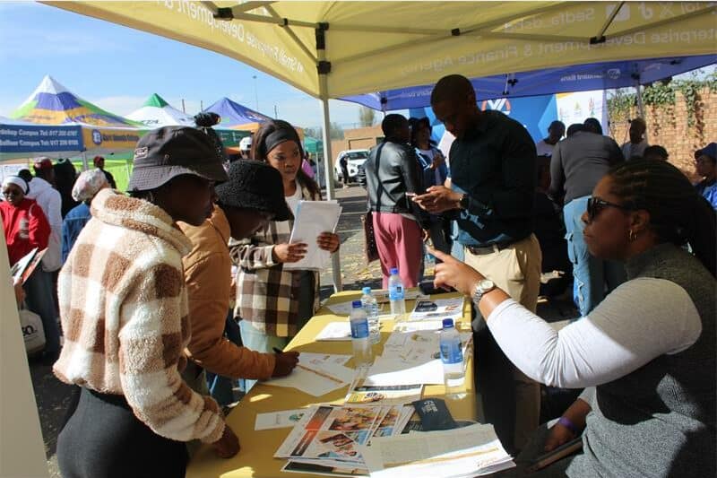 people at a career stall