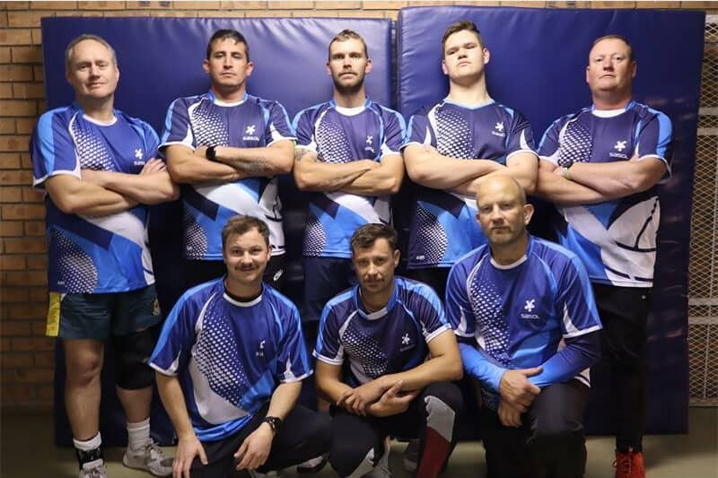 a team of men in blue sport kits