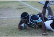 a rugby player scores a try.