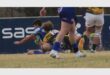 rugby player scores a try