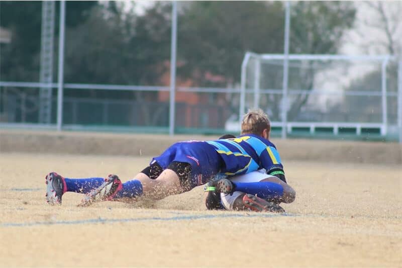 Rugby player making a tackle