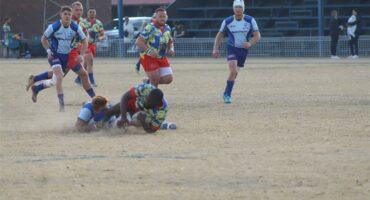 Rugby player making a tackle