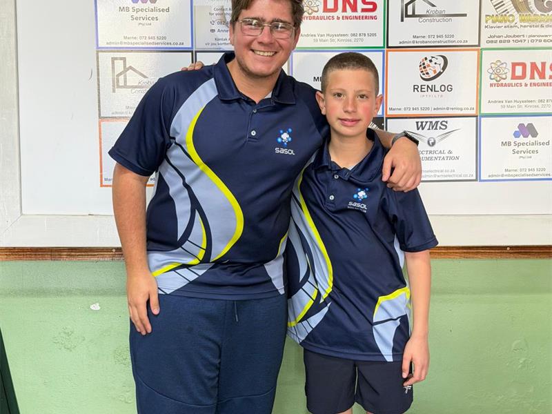 Two boys in blue and white sport clothes