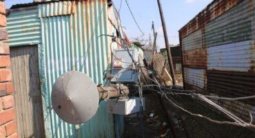 an electricity poles is toppled over