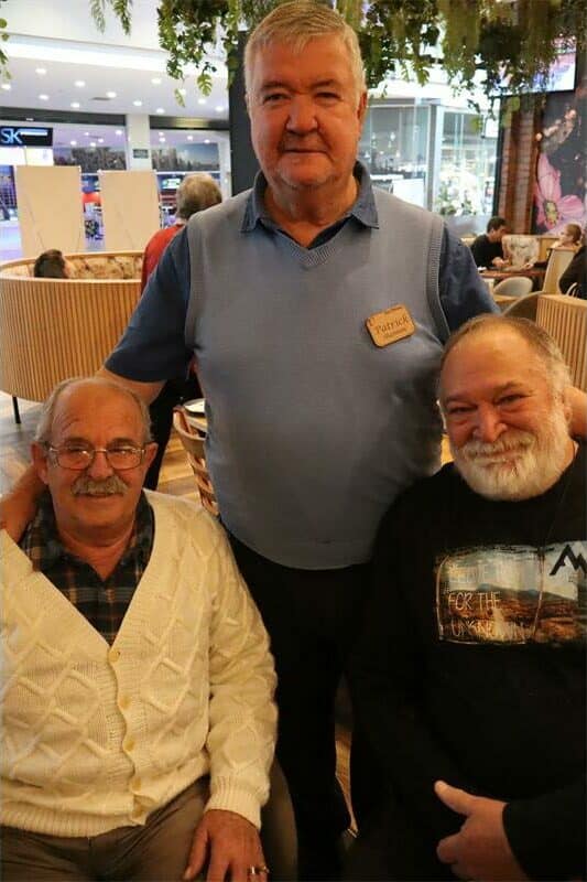 three elderly men