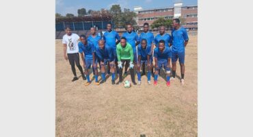 a sports team in blue kits