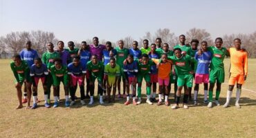 a large group of soccer players