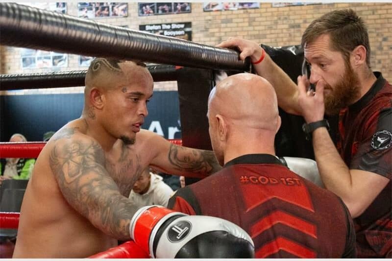 man with many tatooes in the ring