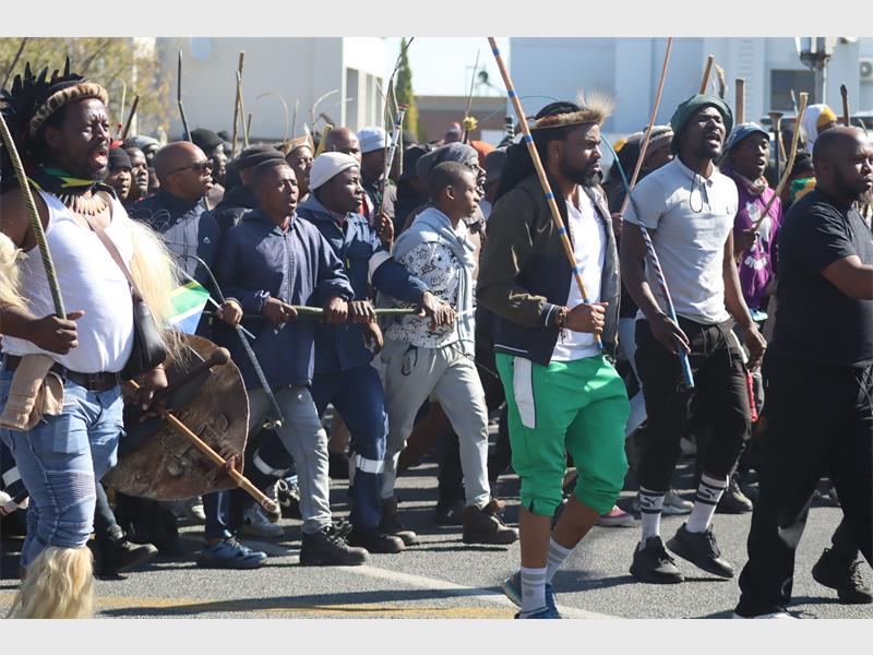 people march in the street