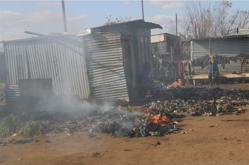 heaps of garbage being burned
