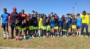 a large group of soccer players