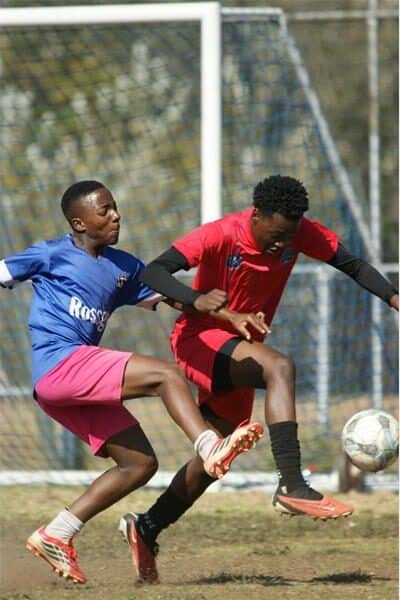 image of soccer players in action