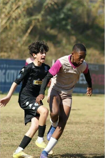 image of soccer players in action