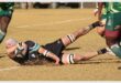 a rugby player scores a try