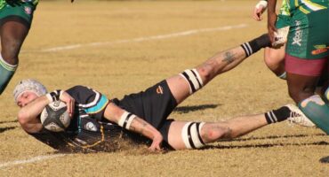 a rugby player scores a try