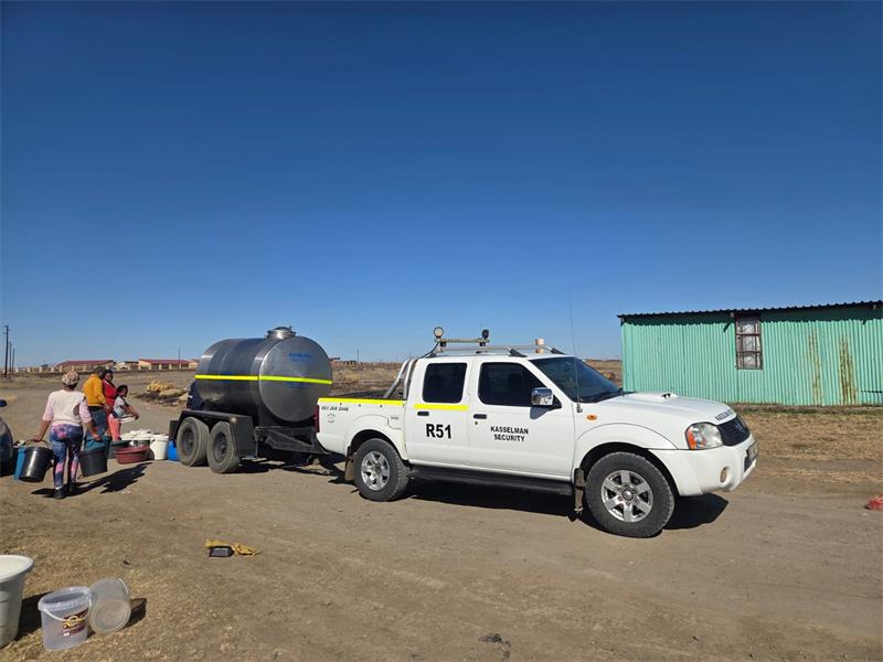a bakkie pulling a portable water tank