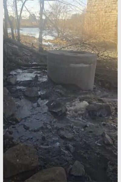 a screen shot of a video about overflowing sewer