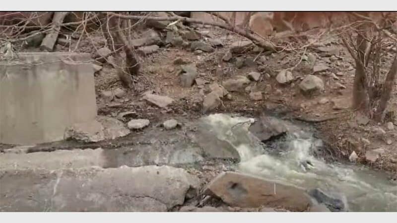 a screen shot of a video about overflowing sewer