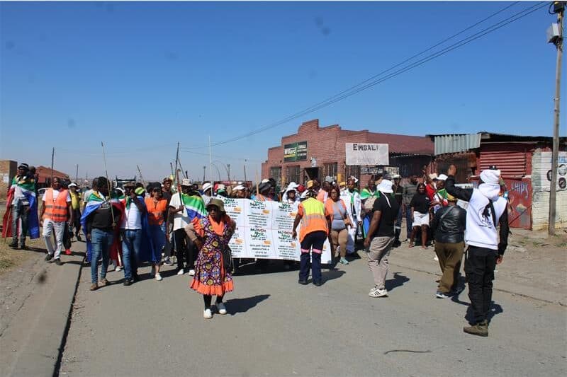 people marching the the street