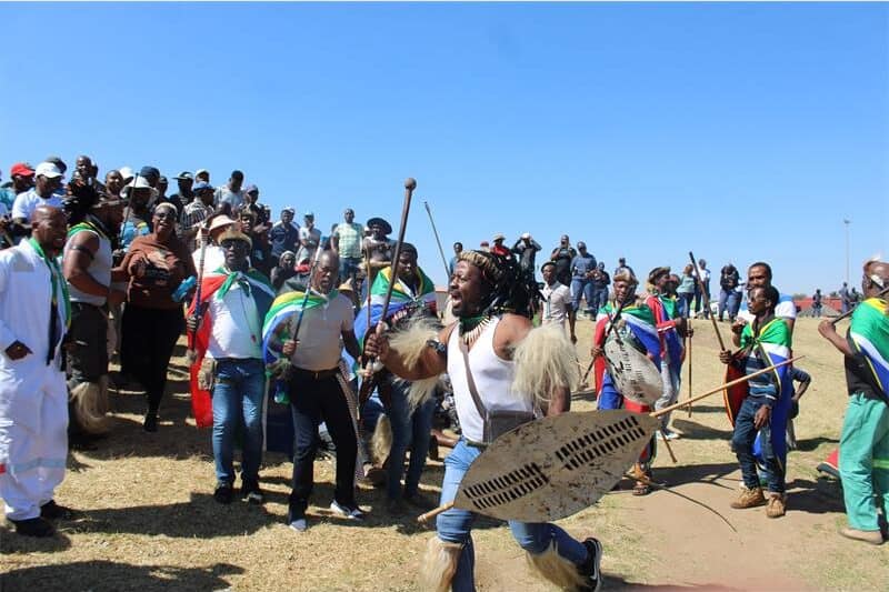 people marching the the street