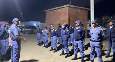 police members line up for inspection