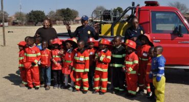 children dressed as fire fighters