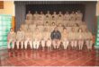 a large group of people in uniform