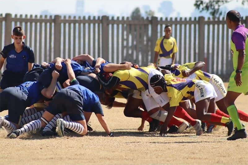 two rugby teams in a scrum