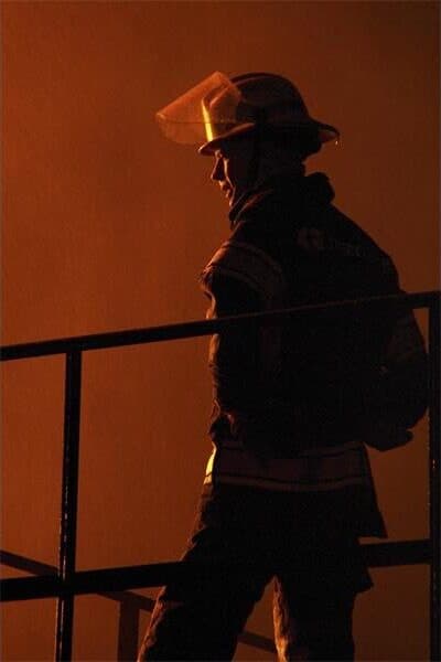 the photo siloette of a fire fighter