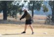 a man in short pants plays golf