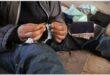 a homeless woman does sewing