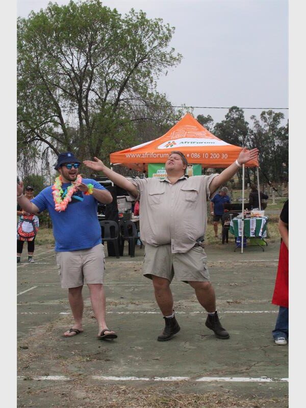 big man with his hands in the air