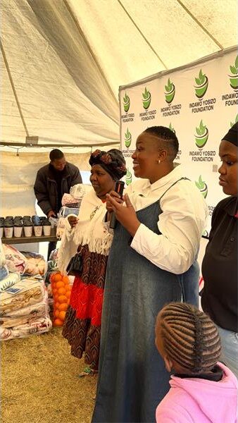 women speaking to the community