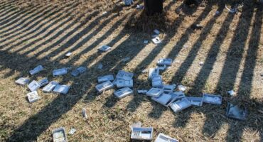 digital devices being scattered on the grass