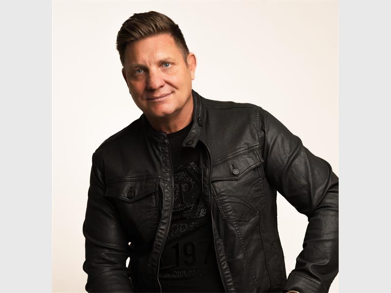 man in a black leather jacket