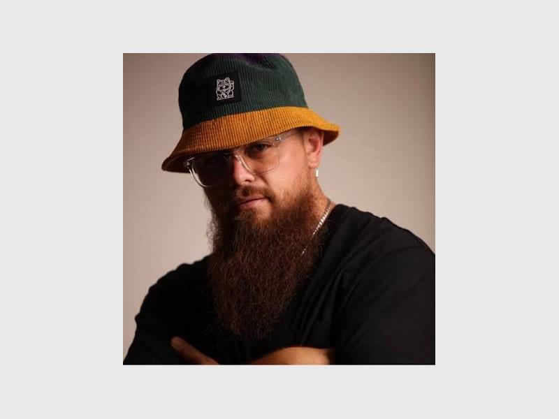 a man with a hat and beard